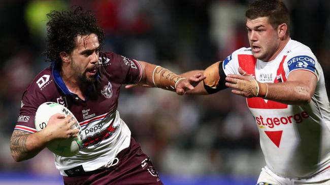 Josh Aloiai, left, is among the Manly players who won’t play this weekend. Picture: Jason McCawley/Getty Images