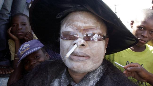 A Haitian woman in a trance during a voodoo ceremony in Port-au-Prince.