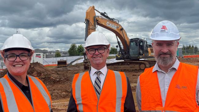 Peter Sidgreaves (middle) with Acting Commissioner Megan Stiffler and Justin Tabone, Axis Constructions Project Manager, at the new Oran Park construction site. Picture: Supplied