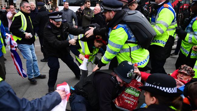 Demonstrators from left and right wing groups clash during a Brexit protest in Trafalgar Square. Picture: /Getty Images.