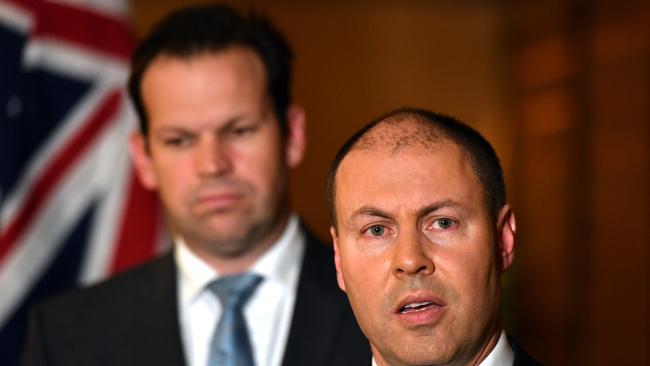 Minister for Resources Matt Canavan and Minister for Energy Josh Frydenberg at a press conference after meeting with state and territory energy ministers at a COAG meeting to discuss the National Energy Guarantee (NEG) at the Shangri La Hotel in Sydney, Friday, August 10, 2018. (AAP Image/Mick Tsikas) NO ARCHIVING