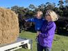 Volunteers battle rough seas amid King Island bale donation
