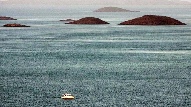 A search boat in 2005 returns to Badu Island after no luck in finding five people missing from an aluminium dinghy during trip from Saibai Island. Picture: Eddie Safarik.