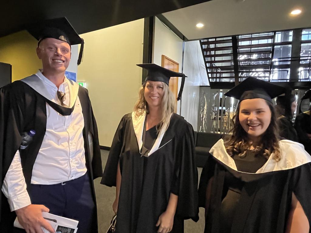 Graduates from the University of the Sunshine Coast's Fraser Coast campus celebrating at the Brolga Theatre.