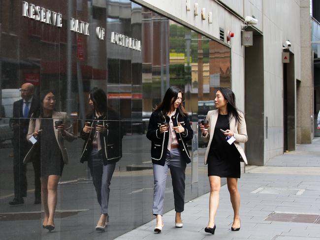 SYDNEY, AUSTRALIA - NewsWire Photos MARCH 02, 2021: A general view of woman walking past the Sydney Reserve Bank in Martin Place  in Sydney, Australia. Picture: NCA NewsWire / Gaye Gerard