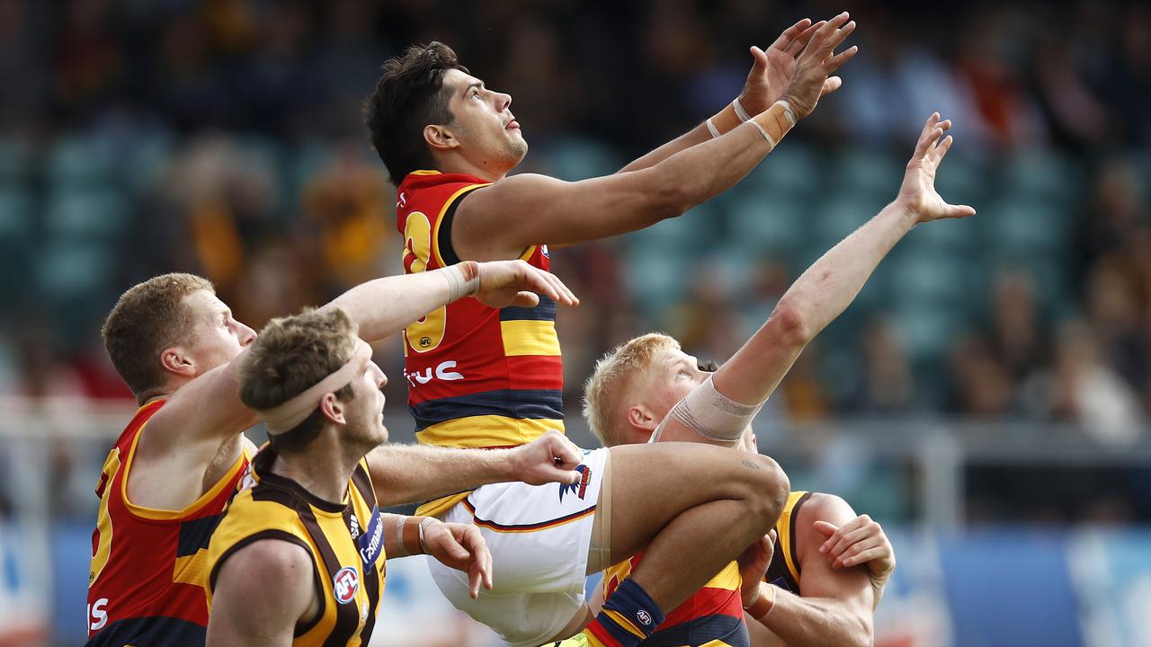 Shane McAdam attempts a serious hanger against the Hawks. Picture: Getty Images