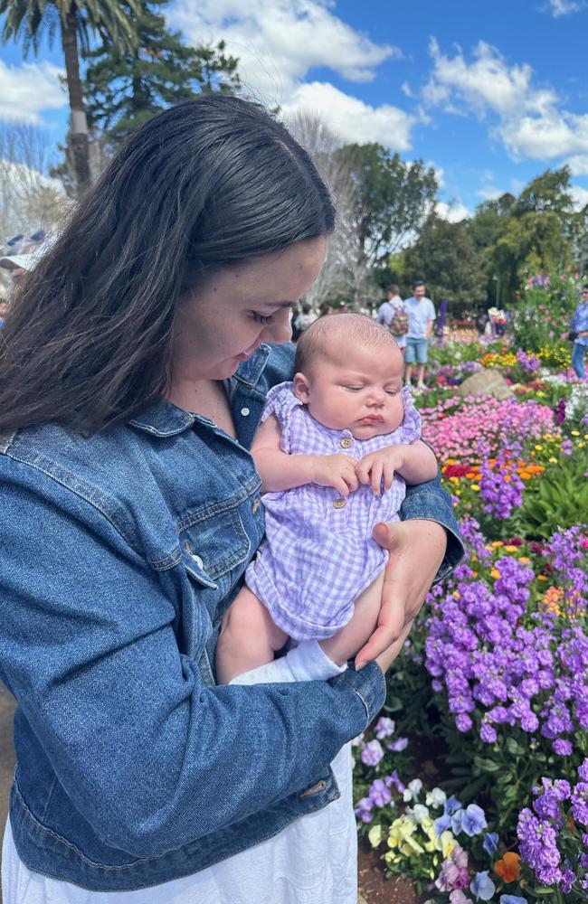 Sara Barnes with baby Leilani who has been voted Burnett's cutest baby 2023.