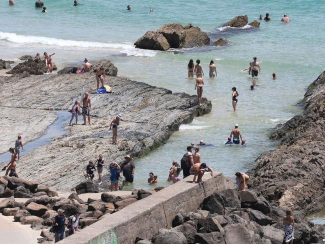 People enjoying Australia day at the Snapper rocks rock pools. Picture Mike Batterham