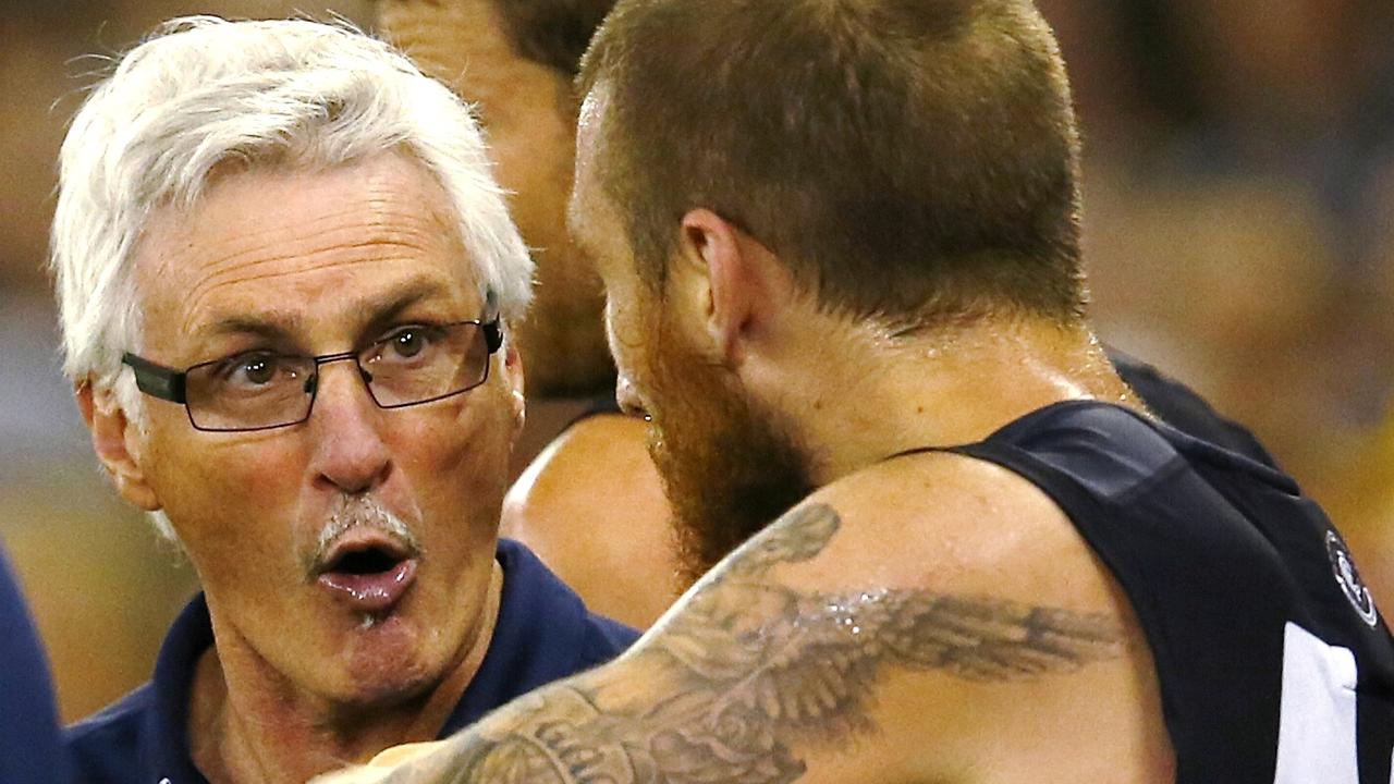 Carlton coach Mick Malthouse gives Zac Tuohy a spray on the bench back in 2014.