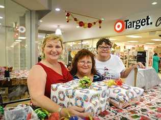 COMMUNITY: Diane Clift, Lyne Russell and Stephanie Vogler raise money for the Victory Church Christmas Day Community Banquet. Picture: Renee Albrecht