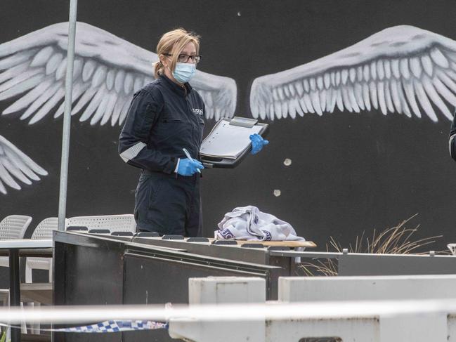 Forensic police on the scene of the shooting at Sweet Lulus cafe in Keilor. Picture: Tony Gough