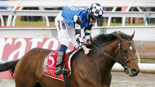 Hindsight is a help: Protectionist, ridden by Ryan Moore, wins in 2014.