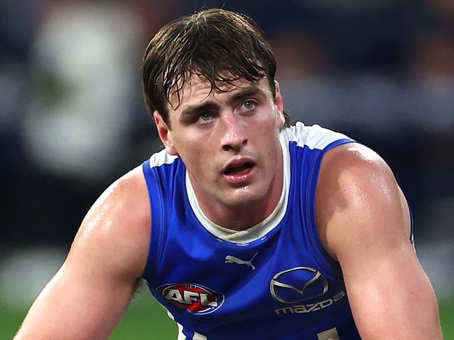 MELBOURNE, AUSTRALIA - JUNE 22:  George Wardlaw of the Kangaroos  look dejected after losing the round 15 AFL match between Melbourne Demons and North Melbourne Kangaroos at Melbourne Cricket Ground, on June 22, 2024, in Melbourne, Australia. (Photo by Quinn Rooney/Getty Images)