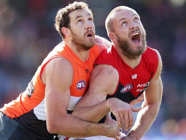 CANBERRA, AUSTRALIA - AUGUST 05:  Max Gawn of the Demons is challenged by Shane Mumford of the Giants during the round 20 AFL match between the Greater Western Sydney Giants and the Melbourne Demons at UNSW Canberra Oval on August 5, 2017 in Canberra, Australia.  (Photo by Matt King/Getty Images)