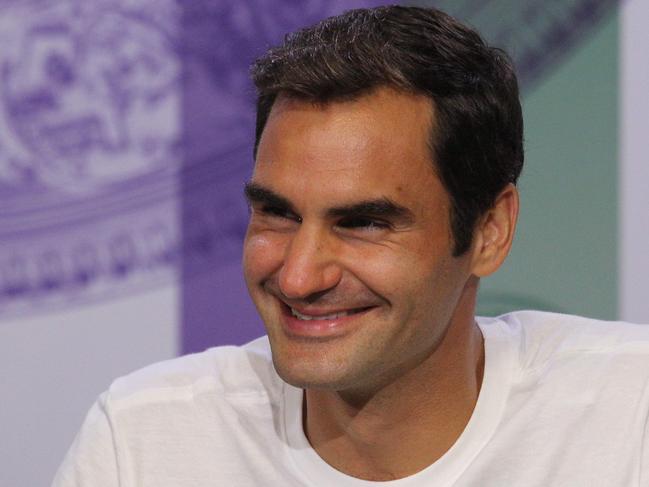 Switzerland's Roger Federer speaks during a press conference after winning his men's singles final match on the last day of the 2017 Wimbledon Championships at The All England Lawn Tennis Club in Wimbledon, southwest London. Federer won 6-3, 6-1, 6-4. Roger Federer won a record eighth Wimbledon title and became the tournament's oldest champion Sunday with a straight-sets victory over injury-hit Marin Cilic who dramatically broke down in tears midway through the final. / AFP PHOTO / POOL / AELTC AND AELTC/David Levenson / David Levenson