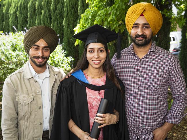 Bachelor of Nursing graduate Parveen with Sahil Deep (left) and Gurinder Singh at a UniSQ graduation ceremony at The Empire, Tuesday, October 29, 2024. Picture: Kevin Farmer