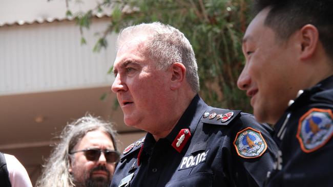 Northern Territory Police Commissioner Michael Murphy chats with Alice Springs residents during coffee with a cop in the Todd Mall, Alice Springs, Thursday December 17 2024. Picture: Gera Kazakov