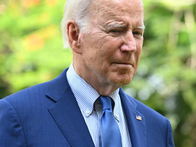 The 79-year-old has a habit of flashing his note cards in front of cameras. Picture: Saul Loeb/AFP