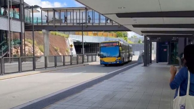 Waiting for the bus at Dutton Park.