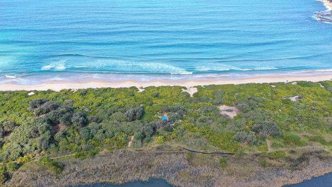 A makeshift campsite, photographed in August 2023, set up by homeless people in the sand dunes at Dee Why Beach. Picture: Manly Daily