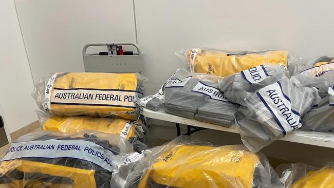 Three men were arrested at a regional Queensland boat ramp last month after they returned to shore carrying 500kg of cocaine.