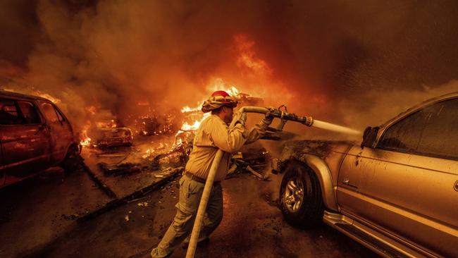 A firefighter battles the Eaton Fire. Picture: AP