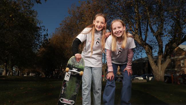 Zailee Jackson 13 with Charlotte Leppard 13 who are Shredding for Cystic Fibrosis Tasmania. The girls have set the challenge of taking 65 pictures shredding during the month of May. Picture: Nikki Davis-Jones