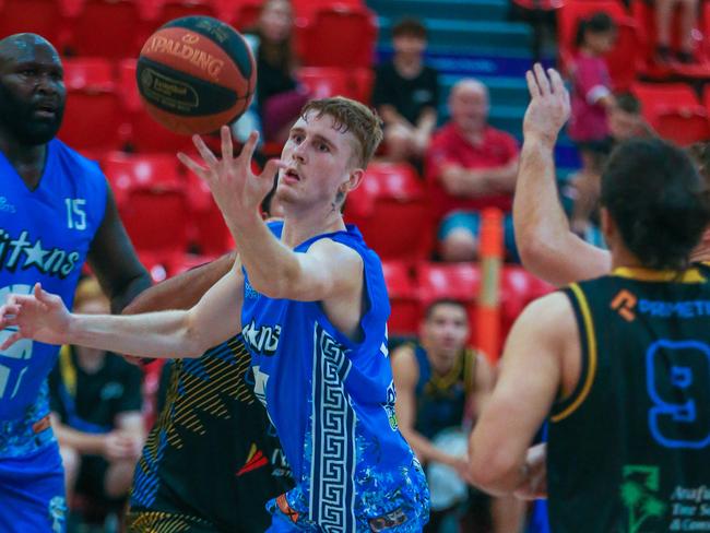 Ellas Titans’ Clayton Jewel battles for the ball against PaRBA. Picture: Glenn Campbell