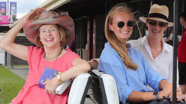 Horses being viewed before the Magic Millions Sales at Bundall. Top trainer Gai Waterhouse driving staff Emma Coleman (blue) and Claudia Miller around the sales to view the yearlings.  Picture Glenn Hampson