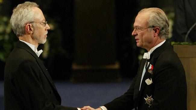 JM Coetzee, left, receives the 2003 Nobel Prize in Literature from Sweden’s King Carl Gustaf in Stockholm. Picture: AFP