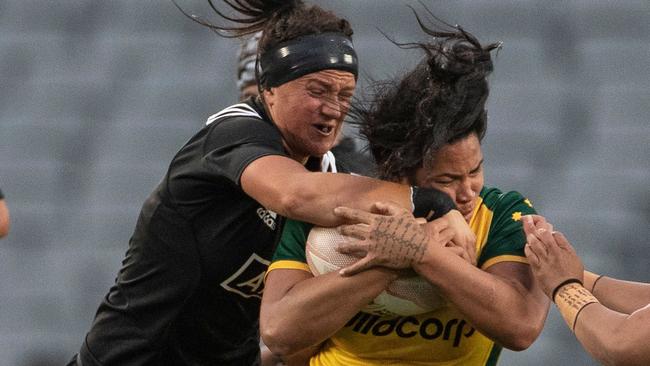 New Zealand’s Liz Patu tackles Australia's Toka Natua in the Test match between the Australia Wallaroos and New Zealand Blacks Ferns in Auckland in 2019.