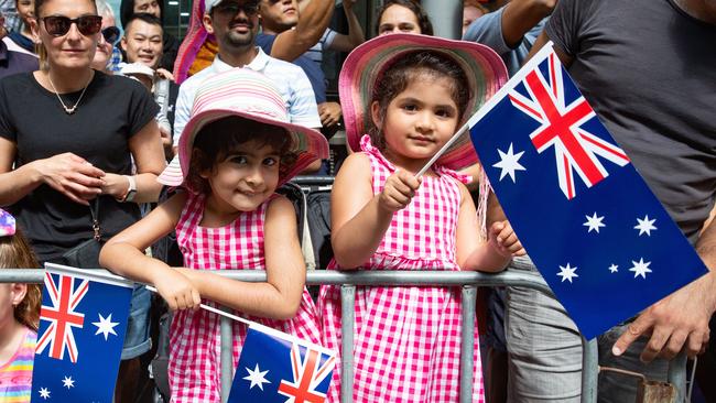 People lined Swanston St to see the The Australia day parade . Picture: Sarah Matray