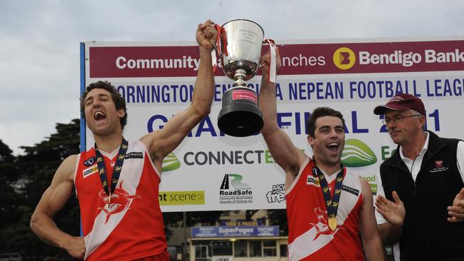 Schwarze (L) raised six premiership cups as Sorrento coach.