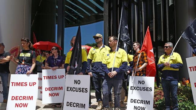 Union members speaking outside 1 William Street in the Brisbane CBD on Wednesday. Picture: NCA NewsWire/Tertius Pickard