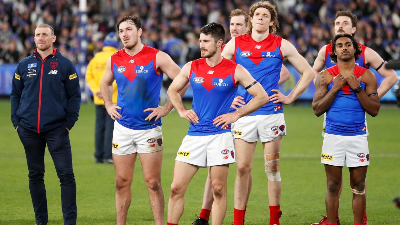The Demons look shell-shocked after the loss to Collingwood. Picture: Michael Willson