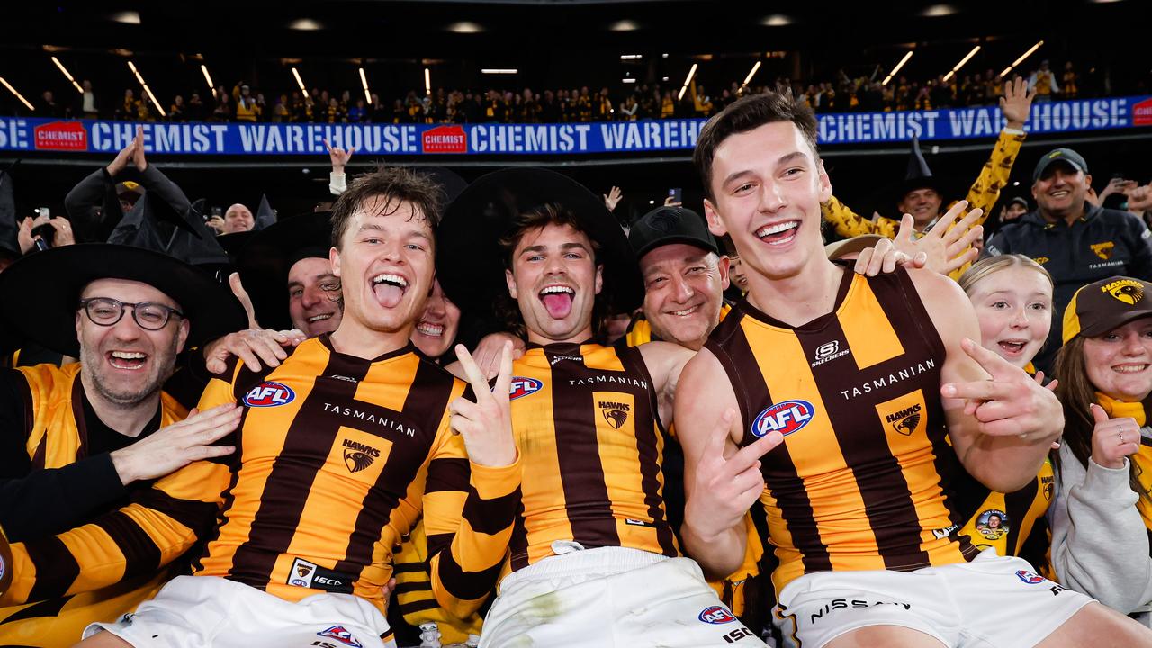 MELBOURNE, AUSTRALIA - SEPTEMBER 06: Jack Ginnivan, Nick Watson and Connor Macdonald of the Hawks pose for a photo during the 2024 AFL Second Elimination Final match between the Western Bulldogs and the Hawthorn Hawks at The Melbourne Cricket Ground on September 06, 2024 in Melbourne, Australia. (Photo by Dylan Burns/AFL Photos)