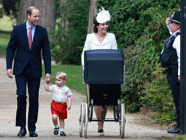 Catherine, Duchess of Cambridge, Prince William, Duke of Cambridge, Princess Charlotte of Cambridge and Prince George of Cambridge are saluted by a policeman as they arrive at the Church of St Mary Magdalene on the Sandringham Estate for the Christening of Princess Charlotte of Cambridge on July 5, 2015 in King’s Lynn, England. Picture: Getty