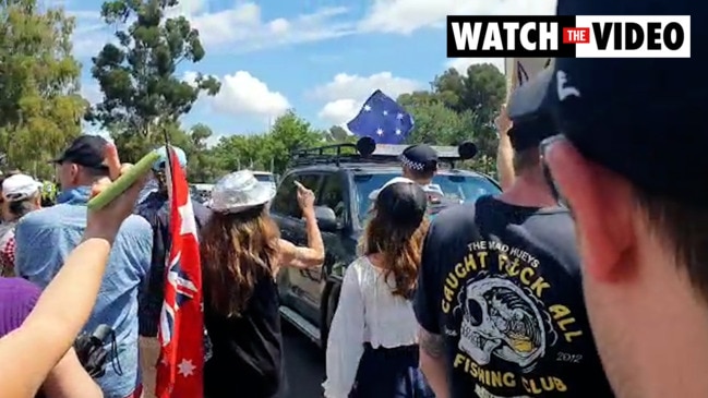 Huge anti-vax protest descends on Parliament House in Canberra