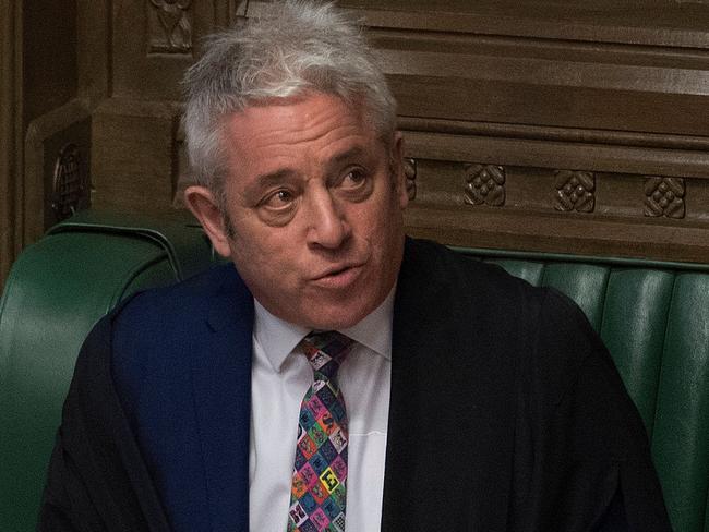 A handout photograph taken and released by the UK Parliament on March 27, 2019 shows Speaker of the House of Commons John Bercow speaking during the weekly Prime Minister's Questions (PMQs) question and answer session in the House of Commons in London. - Prime Minister Theresa May on Wednesday pledged to step down if MPs back her EU divorce deal, in a bid to break the Brexit deadlock in Britain's fractured parliament. Her dramatic gambit came just two hours before MPs started a flurry of votes seeking a last-minute alternative Brexit plan to replace her deal. (Photo by JESSICA TAYLOR / various sources / AFP) / EDITORS NOTE THE IMAGE HAS BEEN DIGITALLY ALTERED AT SOURCE TO OBSCURE VISIBLE DOCUMENTS  - RESTRICTED TO EDITORIAL USE - NO USE FOR ENTERTAINMENT, SATIRICAL, ADVERTISING PURPOSES - MANDATORY CREDIT " AFP PHOTO /JESSICA TAYLOR/ UK Parliament"