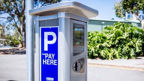 A paid parking meter. Parking rules are a contentious issue in the city.