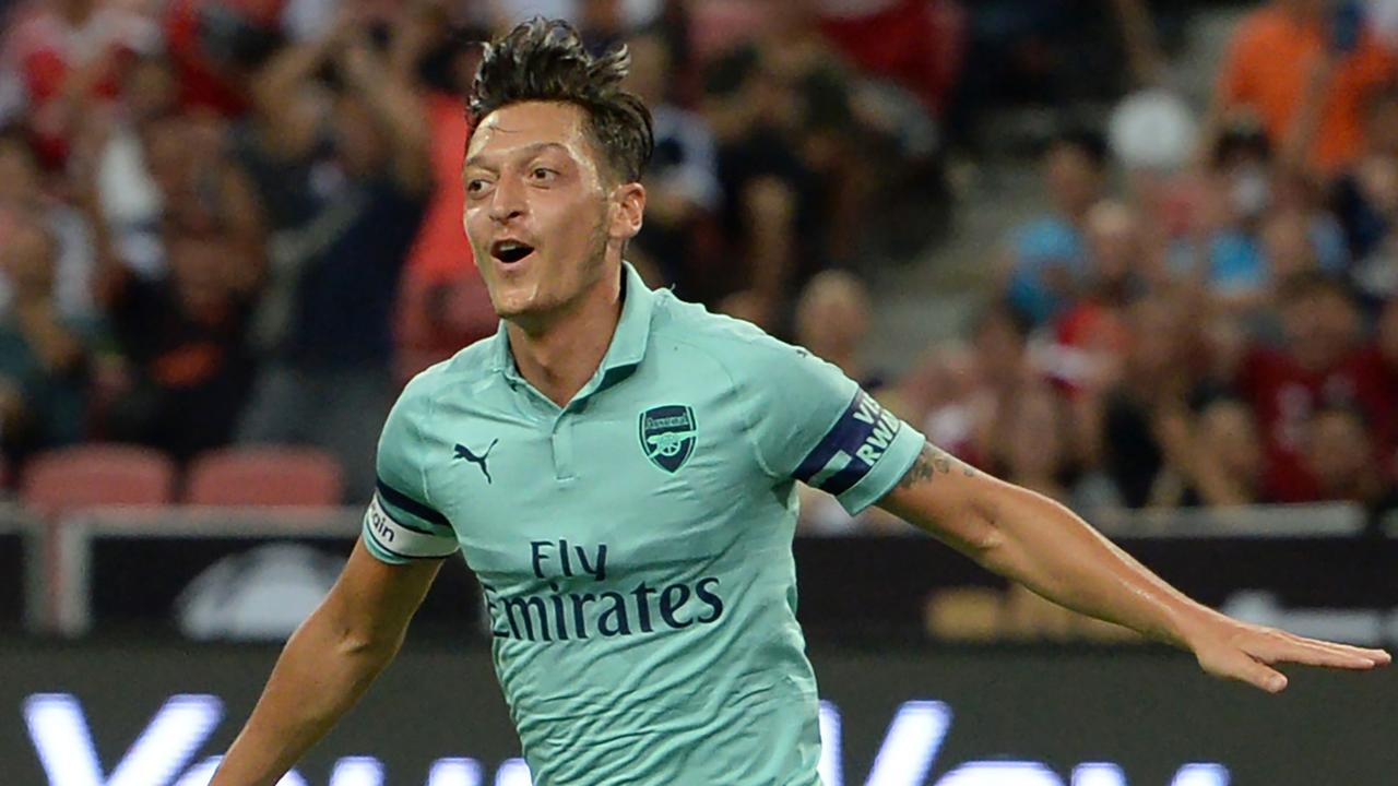 Mesut Ozil of Arsenal celebrates after scoring