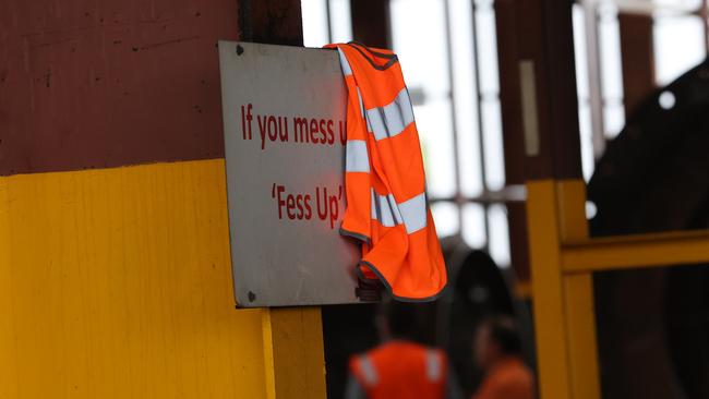 ELECTION TEAM 2022LIBERAL BUS TOUR 26/4/2022A sign that says if you mess up fess up is covered by staff of the workshop at the direction of PMO.The Prime Minister, Scott Morrison is in the Electorate of HERBERT, Townsville, QLD visiting TEi Services, a locally and privately owned engineering and steel fabrication company located in, North Queensland, with local Federal Member Mr Phillip Thompson OAM MP.  ATTENDING:The Hon Scott Morrison MP,Prime MinisterMr Phillip Thompson OAM MP, Federal Member for HerbertMr Adam Packer, Business Development Manager Picture: Jason Edwards