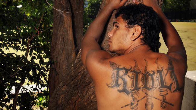 Family pride ... Hawthorn star Cyril Rioli has his family surname tattooed across his back