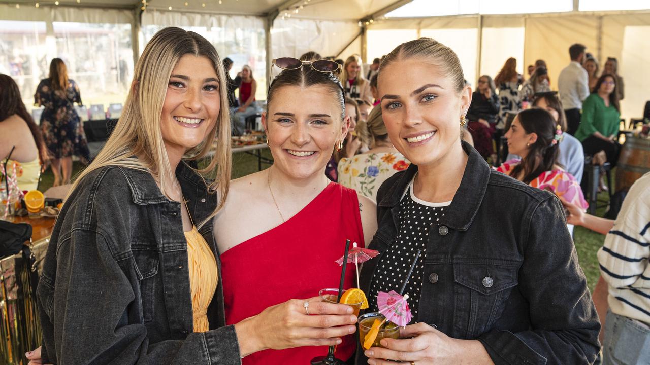 At the Sparkling Soiree Ladies Day are (from left) Steffanie Goodwin, Jacquie Fairweather and Courtney Morris hosted by Willowburn Football Club. Picture: Kevin Farmer