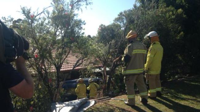 The embankment where Tara’s car rolled near a Molendinar house. Photo: Josh Adsett