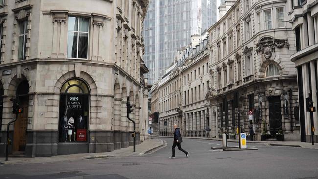 A lone pedestrian on London’s near-deserted streets last week, Picture: AFP