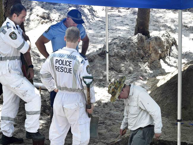 Archaeologist Tony Cowe and police rescue searching for the body back in 1995.