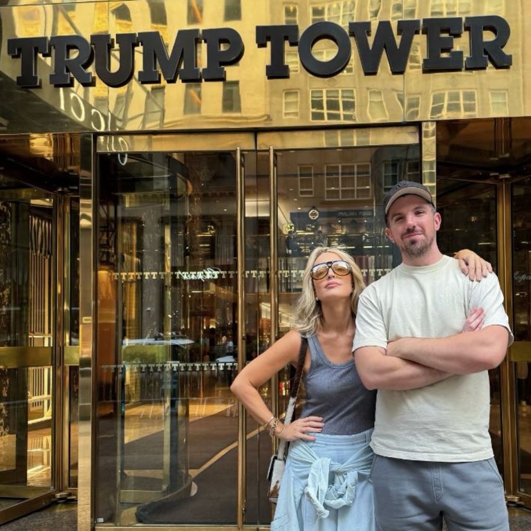 Jackie O and colleague Brooklyn Ross pose in front of Trump Tower in New York.