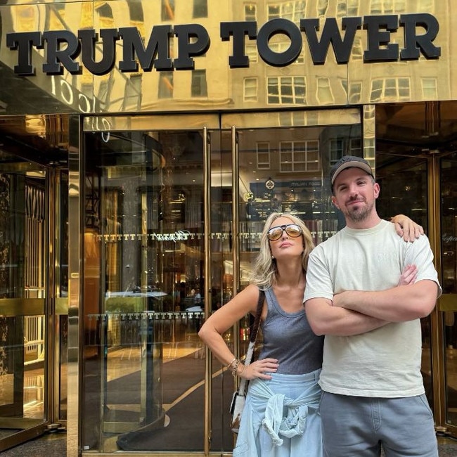 Jackie O and colleague Brooklyn Ross pose in front of Trump Tower in New York.