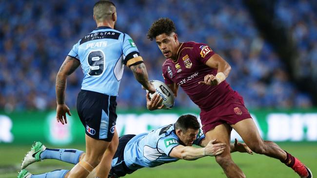 Dane Gagai is a handful for the Blues.